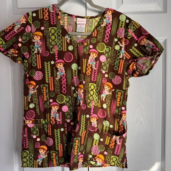 Nickelodeon Dora the Explorer Women's Size S‎ Brown Patterned Scrub Top - Picture 1 of 10